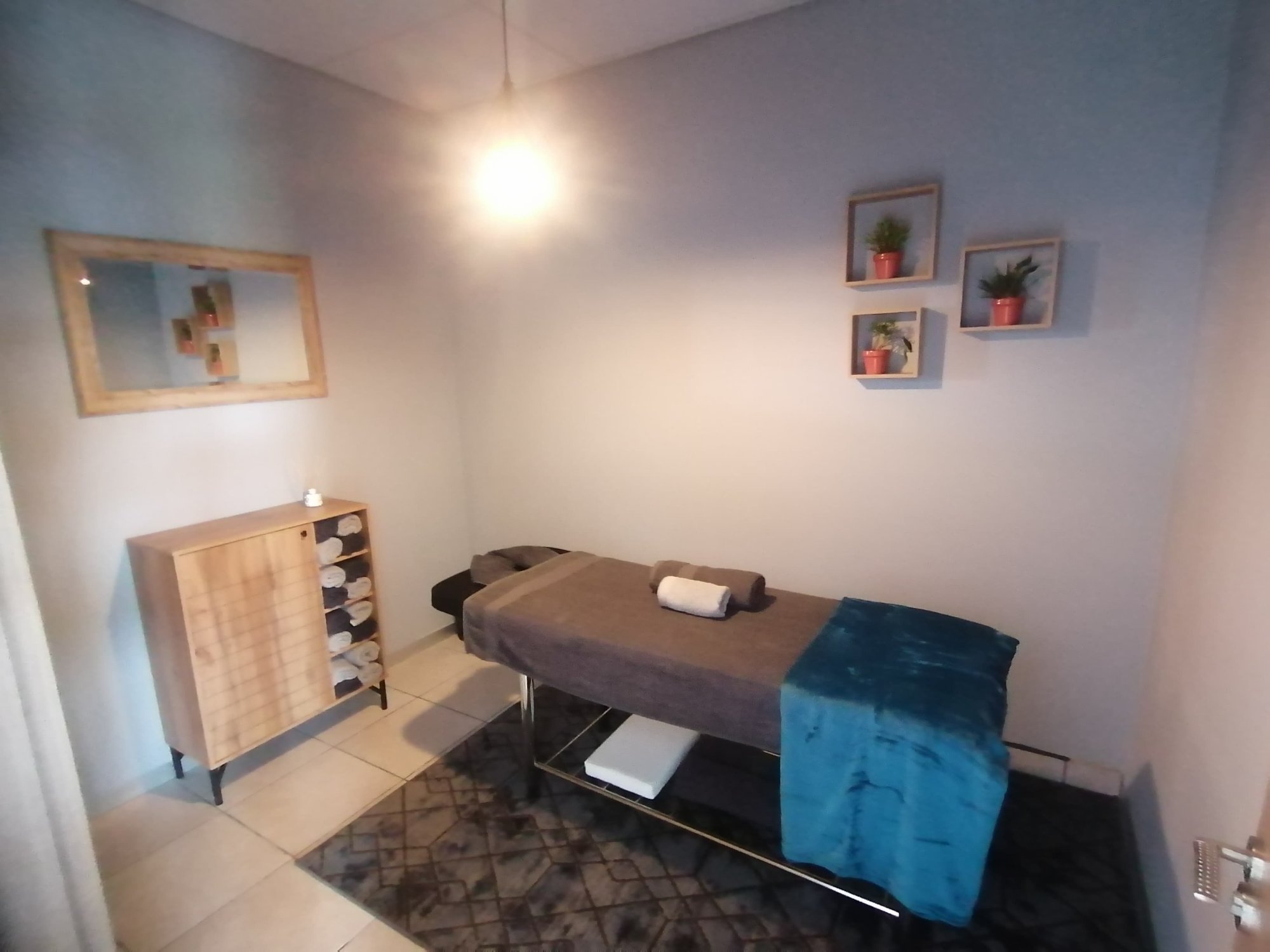 Massage bed in private treatment room